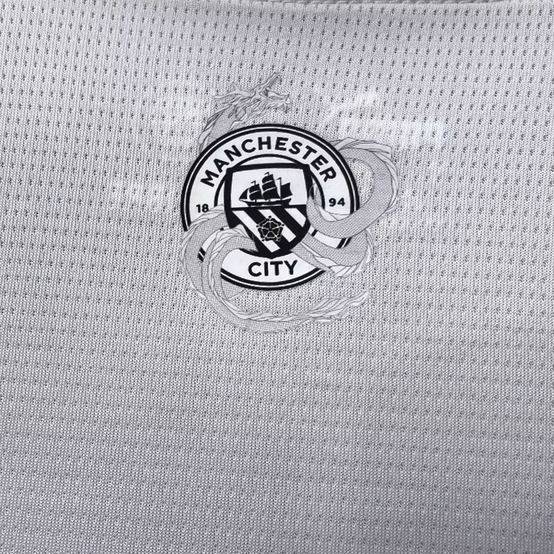 Camiseta del dragón chino del Manchester City